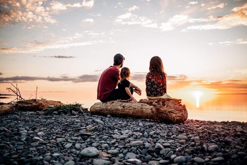 Family enjoying a sunset at beach in Annapolis Valley Nova Scotia