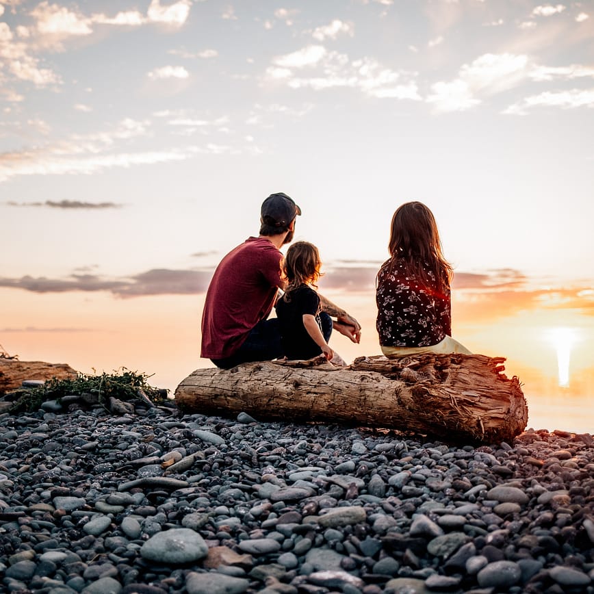 Family enjoying a sunset at beach in Annapolis Valley Nova Scotia